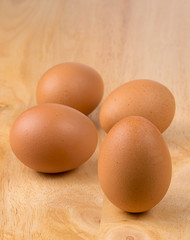 Eggs on wood background