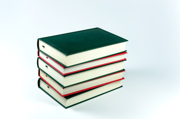 Stack of books on white background