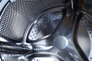 closeup image of washing machine, abstract metallic texture