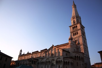 Fototapeta na wymiar Dusk the Cathedral under blue sky in Modena, Italy