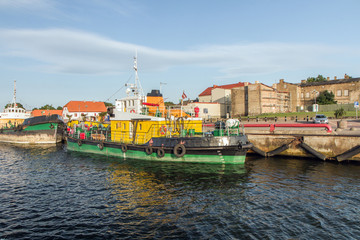 Obraz premium fishing boat in the river