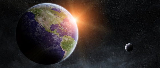 Fototapeta na wymiar Sunrise over planet Earth in space