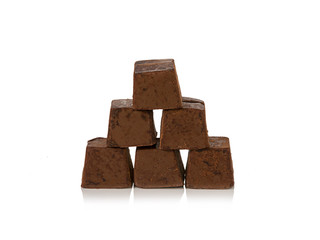 Chocolate pieces on white background