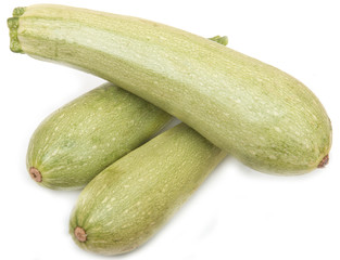 young zucchini on a white background