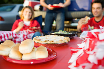 Tailgating: Focus On Apple Pie On Table Of Tailgate Party Food