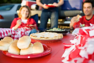 Tuinposter Tailgating: Focus On Apple Pie On Table Of Tailgate Party Food © seanlockephotography