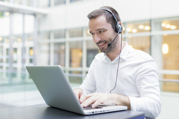 operator speaking with a head set