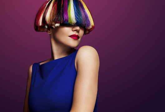 woman with a creatie color of hair. rainbow hair