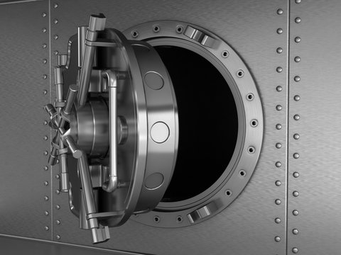 A bank vault with a round armored door