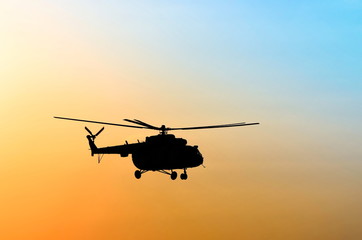 Obraz na płótnie Canvas silhouette of the helicopter