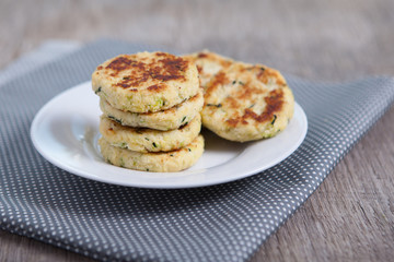 Paleo style zucchini fritters made with coconut flour, selective focus