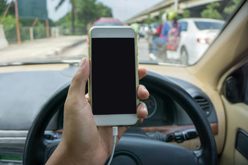 using a smartphone while driving a car