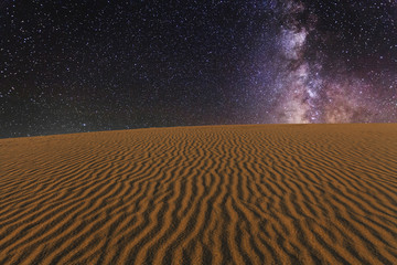Amazing views of the Gobi desert under the night  starry sky. - obrazy, fototapety, plakaty