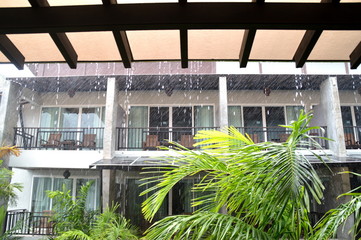 Watching the rain from hotel balcony