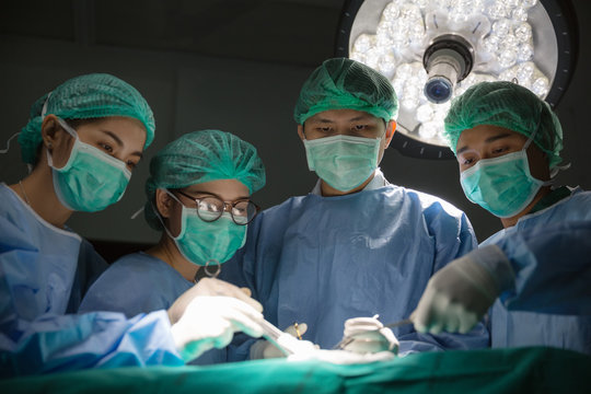Doctor and Surgery team operating