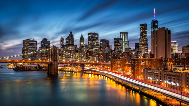 Fototapeta Brooklyn Bridge and the Lower Manhattan at dusk
