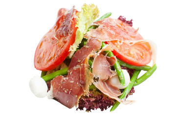 The salad with vegetables and beacon