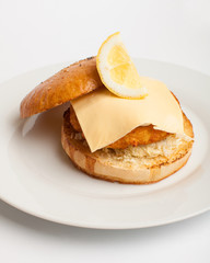 American hamburger with cheese and lemon