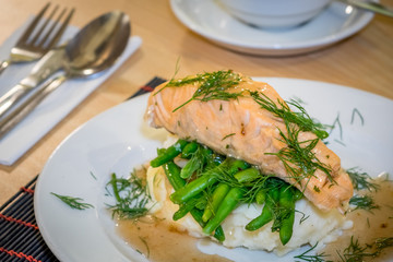 Roast salmon, beans and potatoes