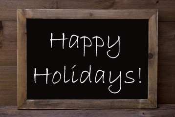 Fototapeta premium Chalkboard With Happy Holidays