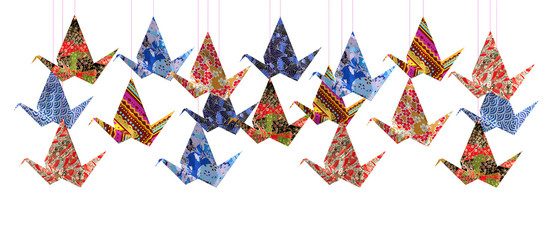 Fototapeta premium Group of Origami paper birds on white background