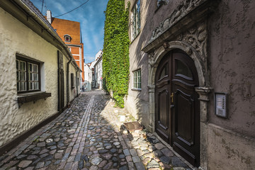 Fototapeta na wymiar Famous narrow medieval architecture building street in old town
