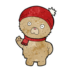 cartoon teddy bear in winter hat and scarf
