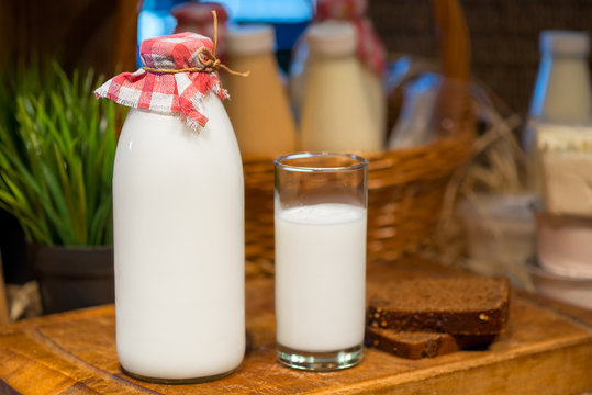 bottle and a glass of cow's milk
