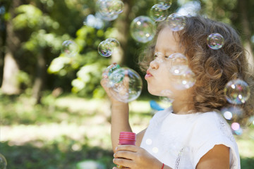 child and soap bubbles