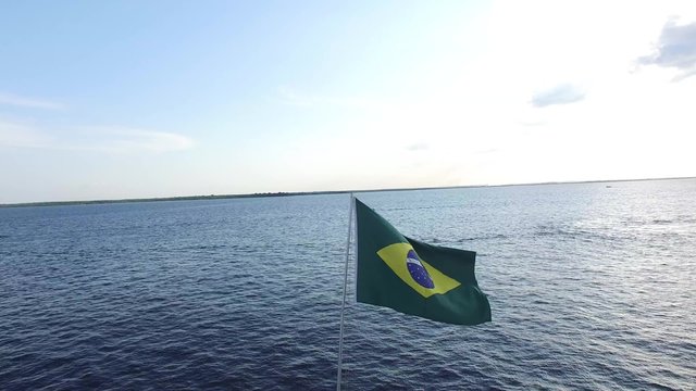 Brazil flag waving in Amazon Port, Manaus, Brazil