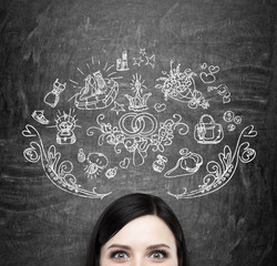 Forehead of brunette woman. Thoughts about marriage and gifts. Shopping concept. Gift icons are...