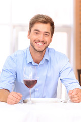 Loving couple drinking wine 