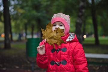 Girl with a maple leaf