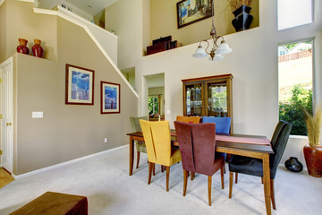 Beautiful living room with white carpet and colorful decor.