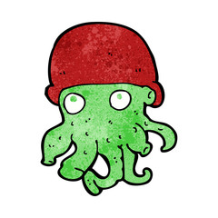 cartoon alien head wearing hat