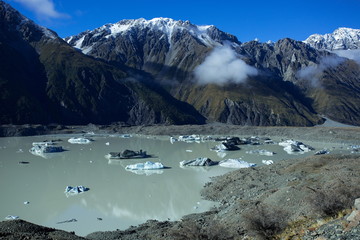 The Tasman Lake in the fall, is with large ice cubes that are loosen from the Tasman Glacier of...