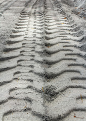 Tire track on muddy road