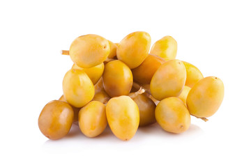 yellow raw dates isolated on white background