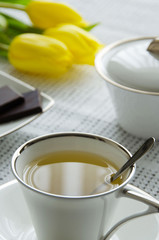 Cup of tea with chocolate