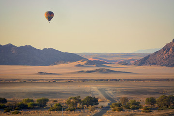 Hot air balloons in Sossusvlei dunes, Namib desert, Namibia