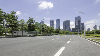 Fototapeta na wymiar empty asphalt road and modern city shenzhen in china