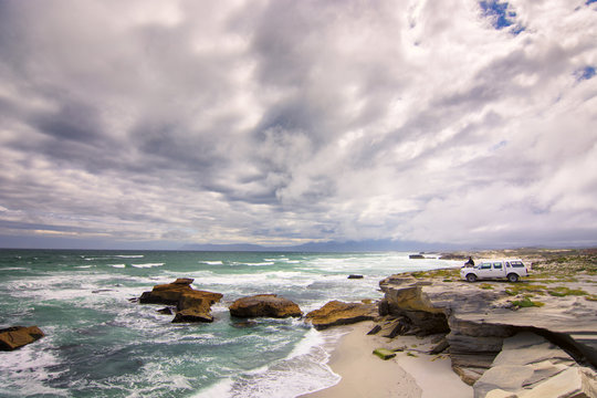 Traveler at the coast of Africa, Atlantic ocean, Western Cape, South Africa