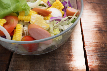 Healthy bowl of salad on table shot in studio
