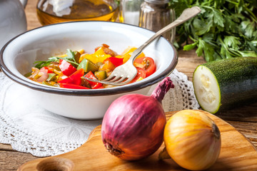 Ratatouille on a rustic table.