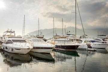 Beautiful white modern yachts at sea port in Montenegro