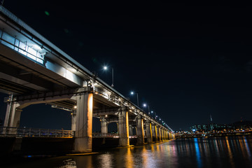 Fototapeta na wymiar Bangpo bridge in the night of Seoul korea with Seoul Tower for Background