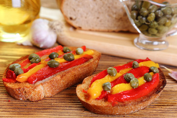Bruschetta with grilled peppers and capers
