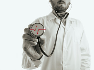 black and white toned photo doctor with stethoscope