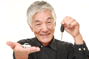 senior Japanese man get a new car