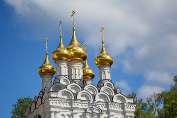 Fototapeta na wymiar Orthodox church with golden domes
